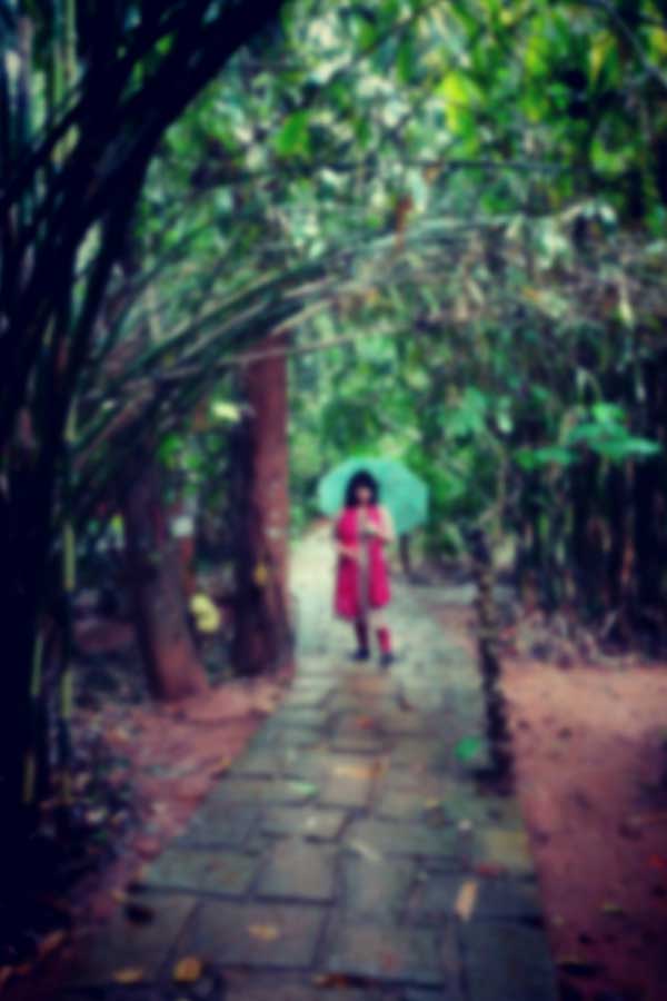 Sanchari standing in the rain